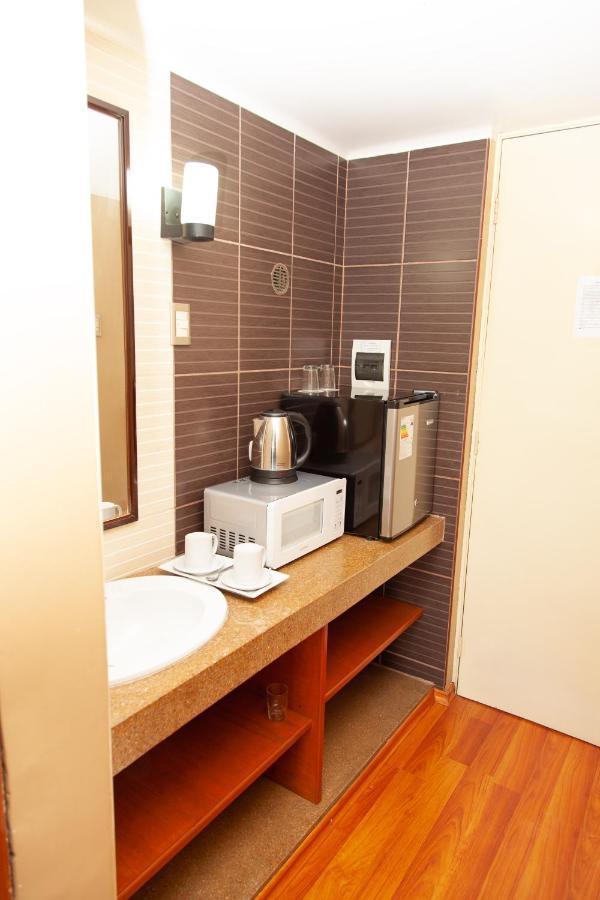 Holiday Suites Такна Экстерьер фото